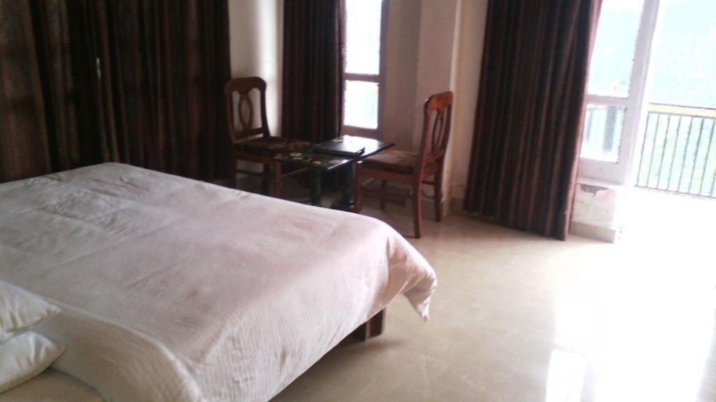 Cozy Swiss Meadows Hotel Khajjiar Room photo